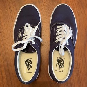 Navy blue Vans with white laces. Brand new.